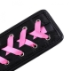 BDSM slapper, black leather, pink ribbon and zircons