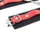 Handcuffs, black straps and red belt