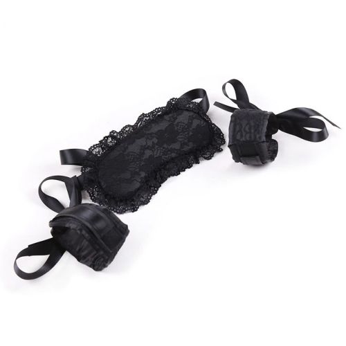 Erotic set, black lace mask and handcuffs