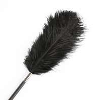 Black tickler and leather slap with a lace pattern