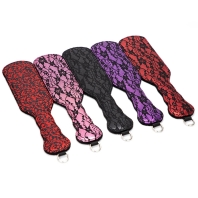 BDSM spanking paddle, red and black color, lace, floral pattern